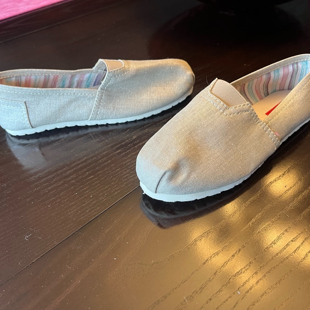 Tan slip on shoes in perfect pristine condition